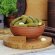 Огурцы корнишоны маринованные домашние Фермерская артель Сельский пир  в глиняной тарелке Маматаки с табличкой